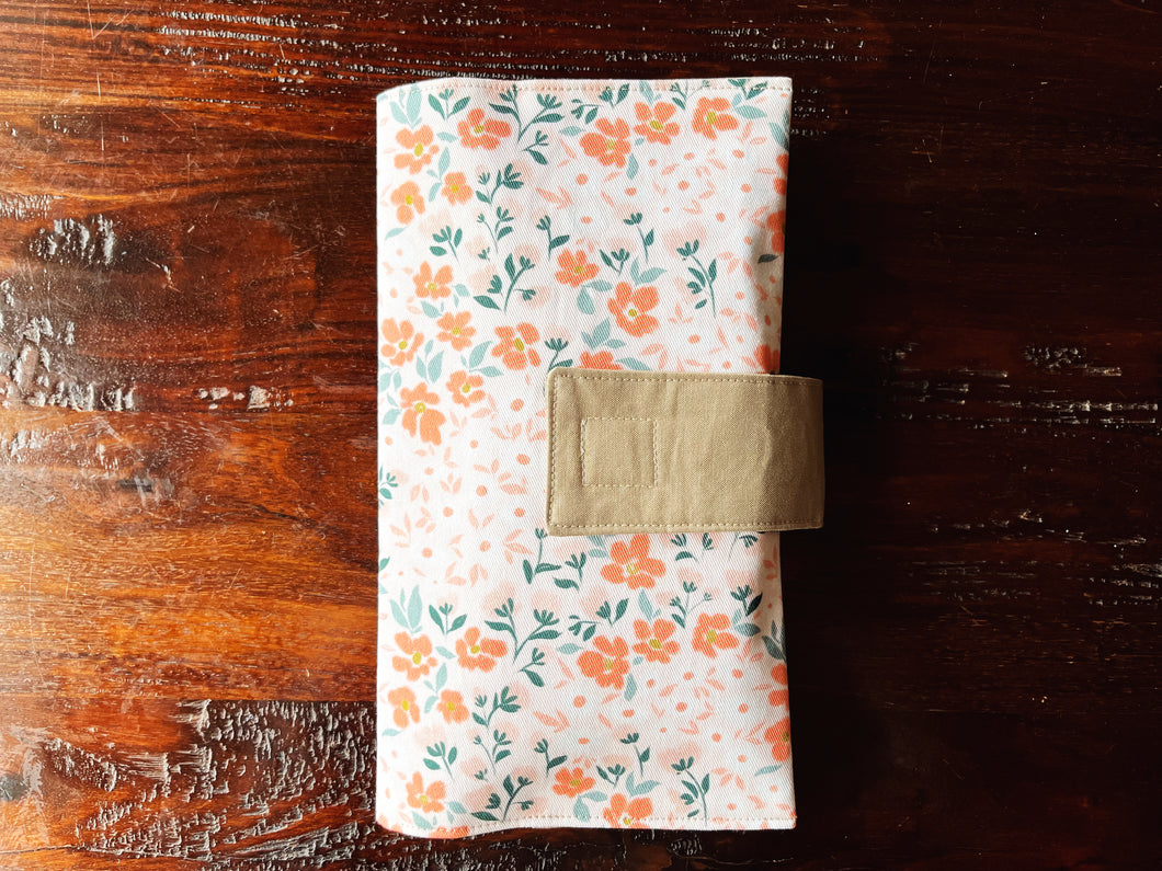 peach floral personalized diaper clutch